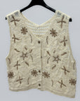 Gilet ricamato con lavorazione crochet e bottoni frontali