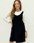 Abito salopette in velluto con maglia in cotone