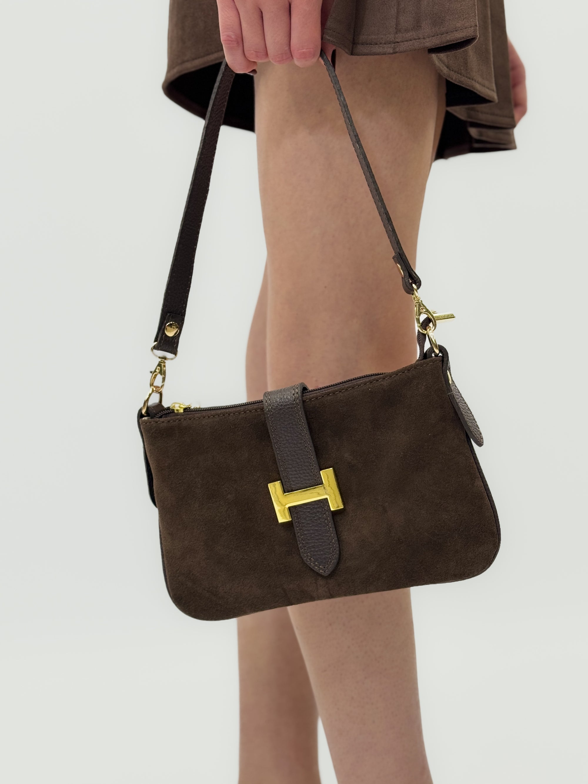 Borsa in vera pelle con fibbia H dorata
