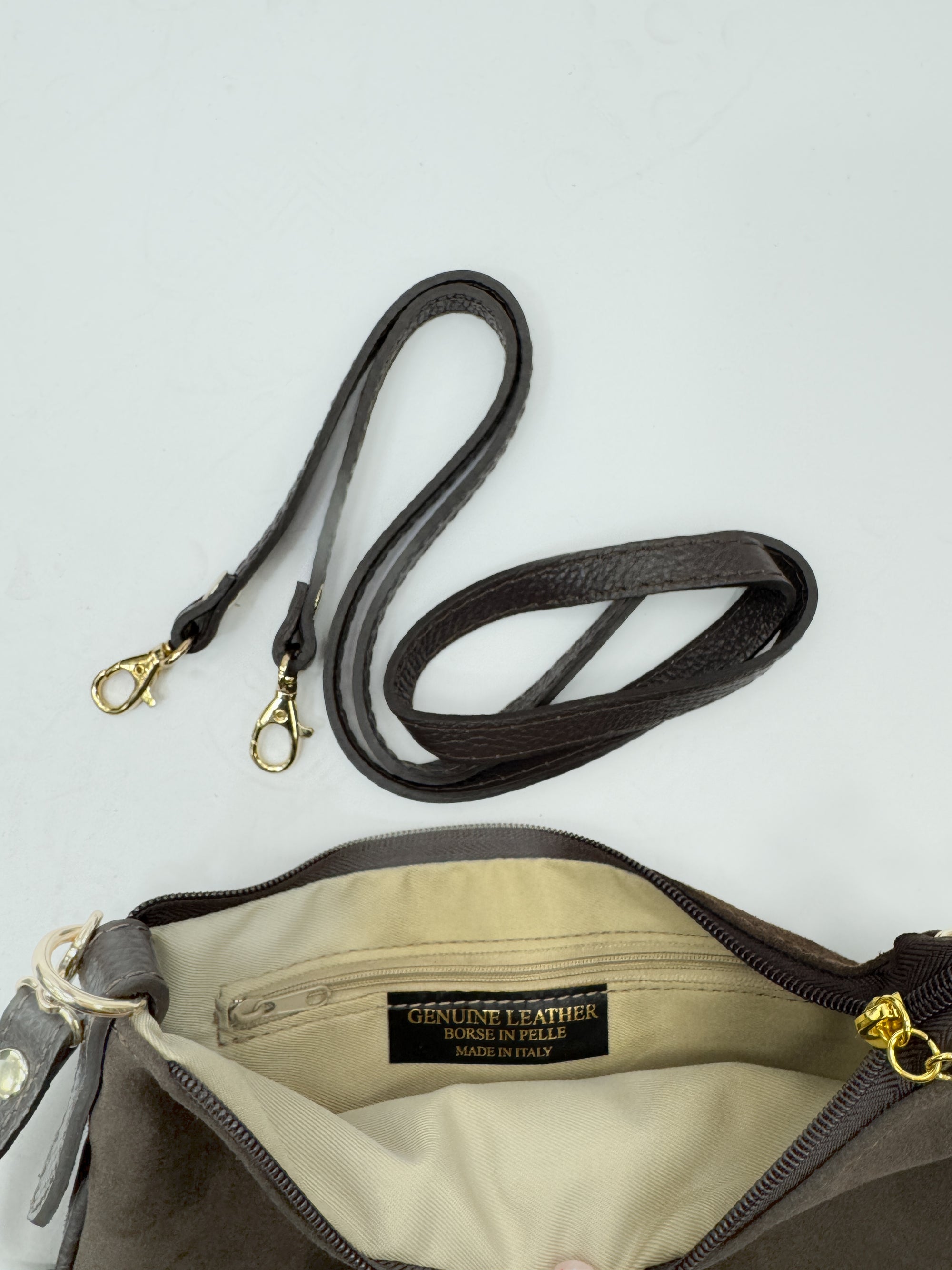 Borsa in vera pelle con fibbia H dorata