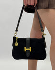 Borsa in vera pelle con fibbia H dorata