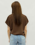 Blusa a righe con nodo laterale