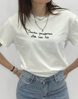 T-shirt con scritta "santa pazienza che non ho"