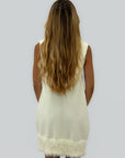 Abito smanicato donna in maglia con bordo in ecopelliccia