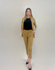 Pantaloni a sigaretta con svolta