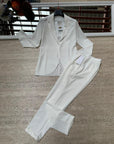 Pantaloni a sigaretta con svolta