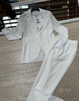 Pantaloni a sigaretta con svolta