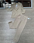 Pantaloni a sigaretta con svolta