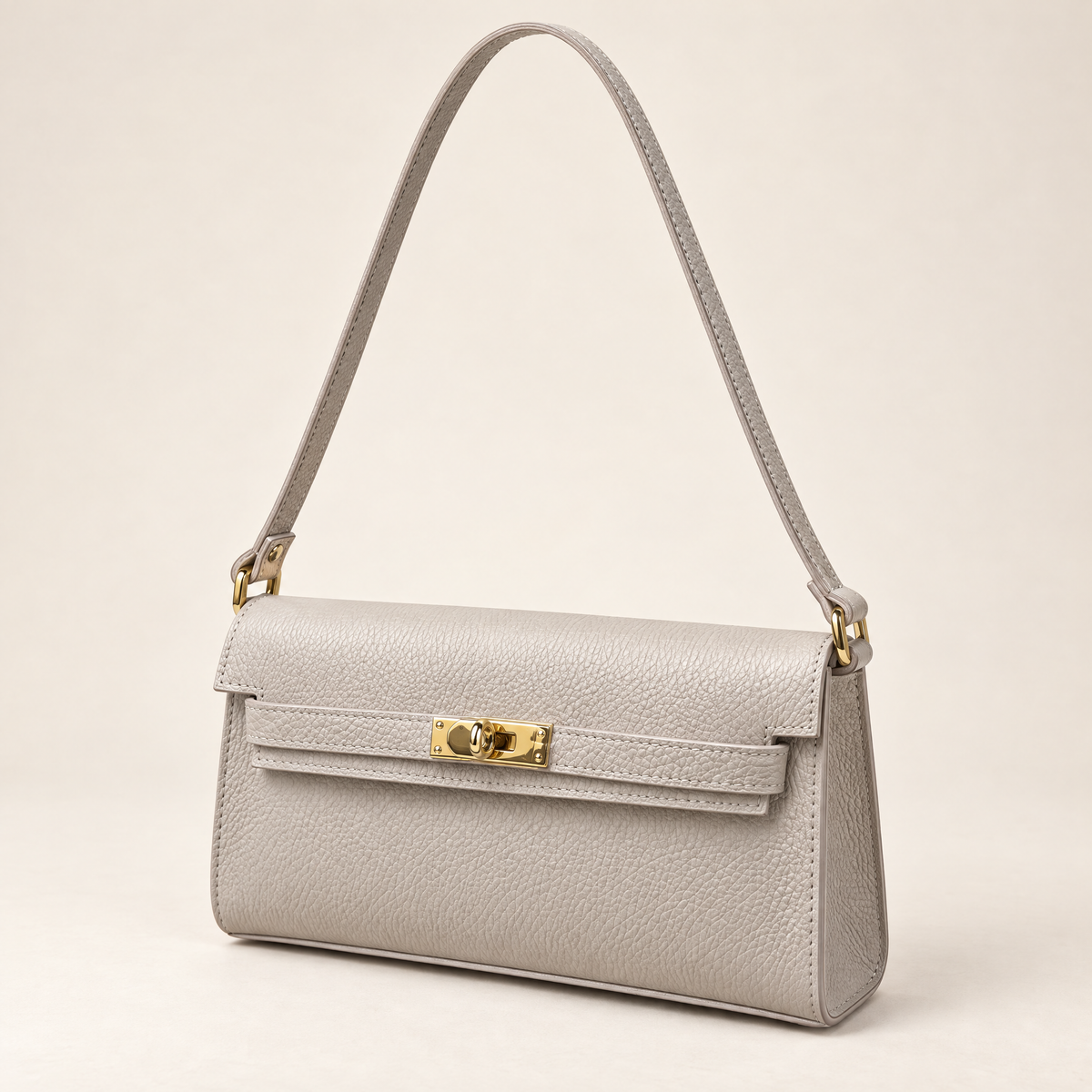 Borsa baguette in vera pelle taupe con chiusura dorata – tre quarti