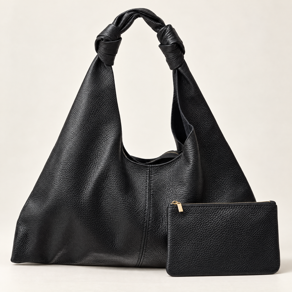 Borsa hobo in vera pelle nero con manico annodato – con pochette coordinata