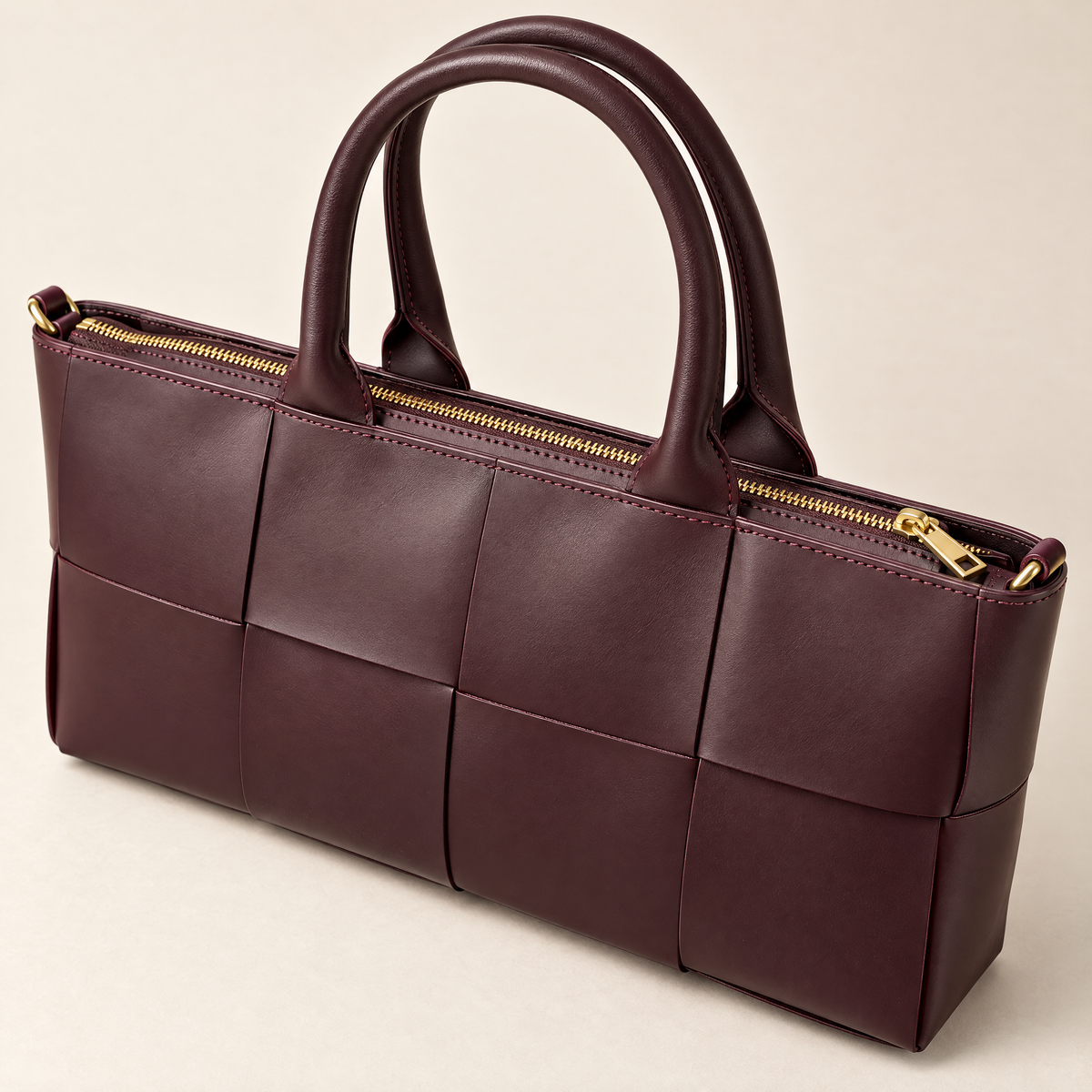 Borsa a mano in vera pelle con maxi intreccio bordeaux – dettaglio
