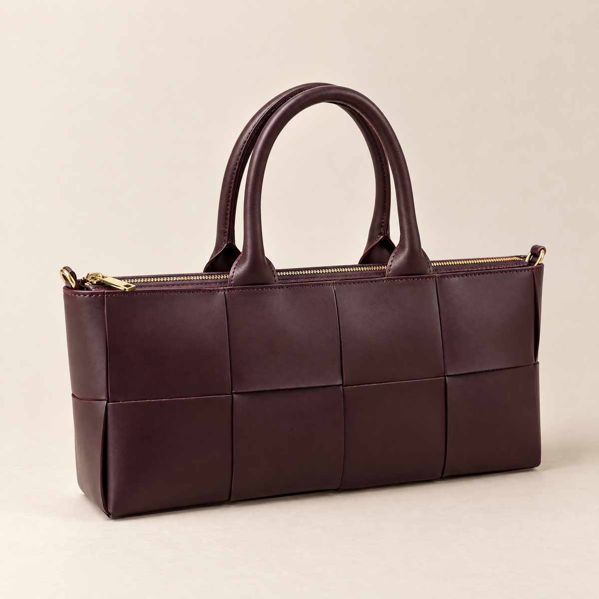 Borsa a mano in vera pelle con maxi intreccio bordeaux – tre quarti