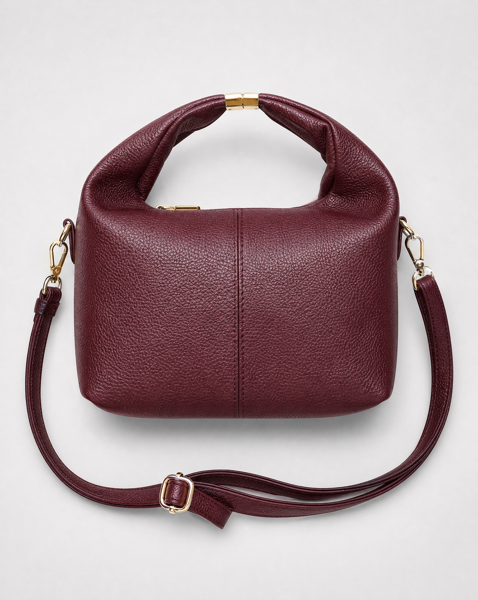 Borsa mini con manico annodato in vera pelle – Bordeaux, dettaglio della vera pelle e del manico
