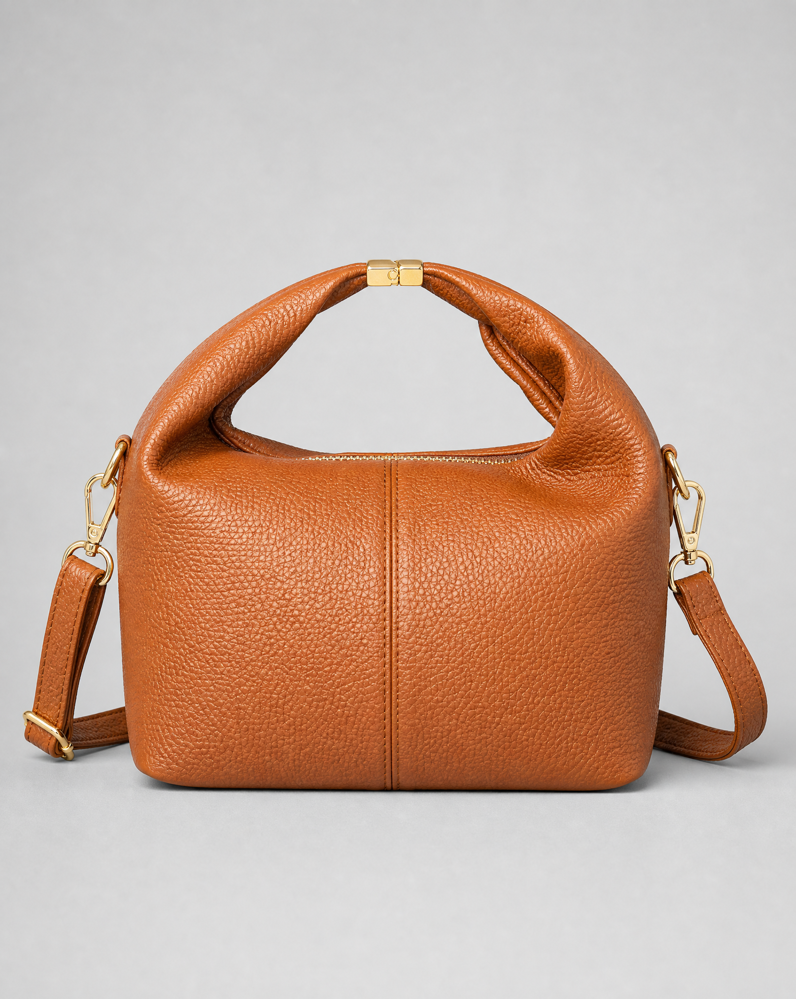 Borsa mini con manico annodato in vera pelle – Camel, dettaglio della vera pelle e del manico