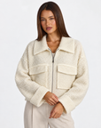 Cardigan donna bouclé con zip bianco — dettaglio con Polly 4