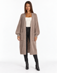 Cardigan lungo con tasche in misto mohair e lana Beige indossato da Polly 4