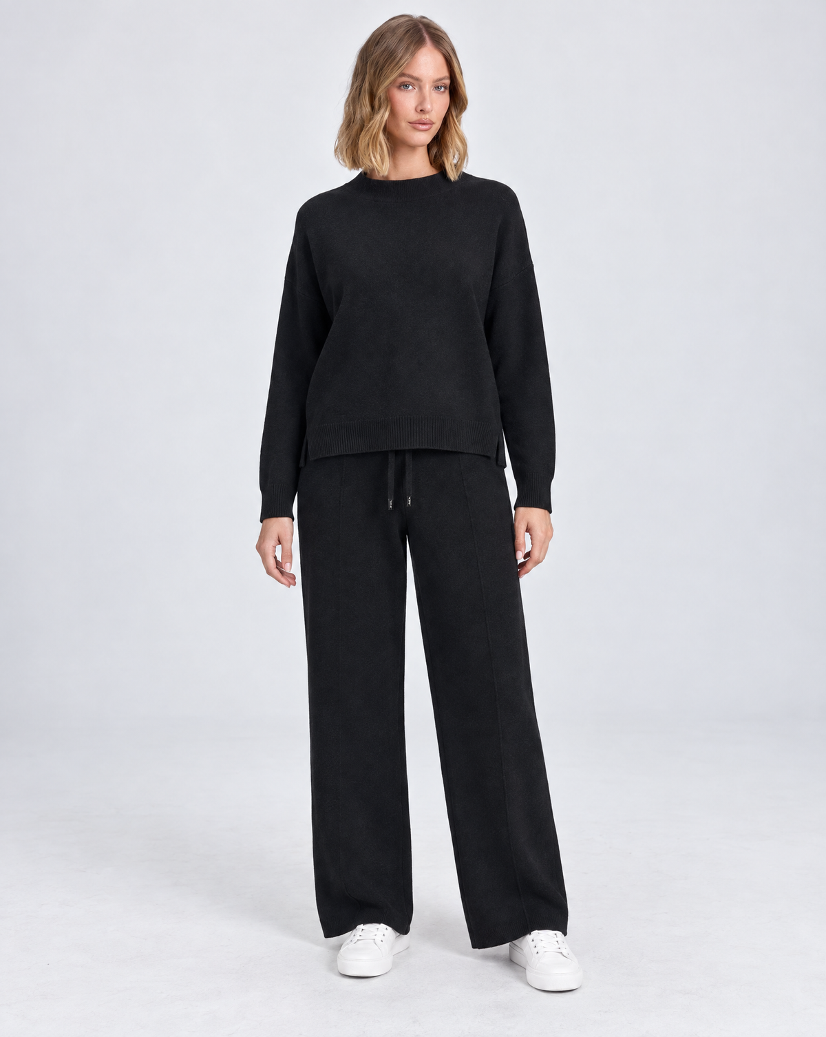 Completo in maglia B12 2311 Nero indossato da Polly 5 - vista frontale