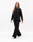 Completo donna con pantalone ampio indossato da Polly 2 - Nero vista frontale