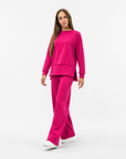 Completo donna con pantalone ampio indossato da Polly 2 - Fucsia vista frontale
