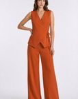 Completo donna elegante con gilet incrociato e pantalone palazzo arancione