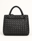 Borsa a mano in vera pelle intrecciata nero con dettaglio dorato - retro