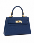 Mini bag a mano in vera pelle blu, vista frontale su sfondo bianco
