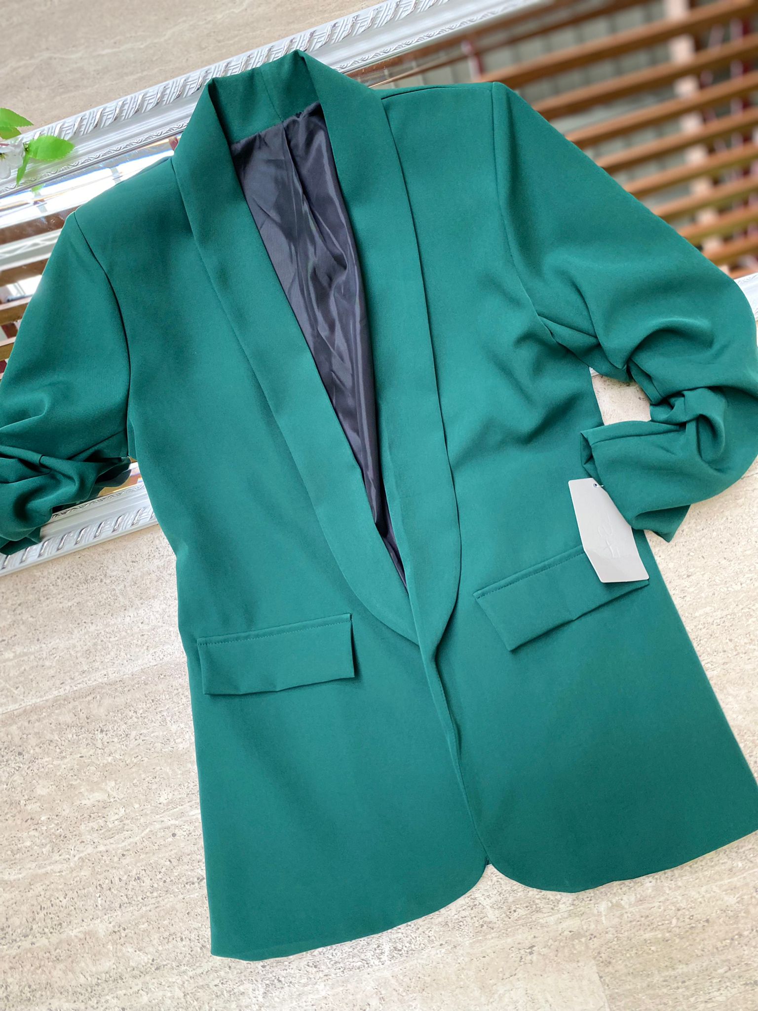 Blazer elegante a manica arrotolata