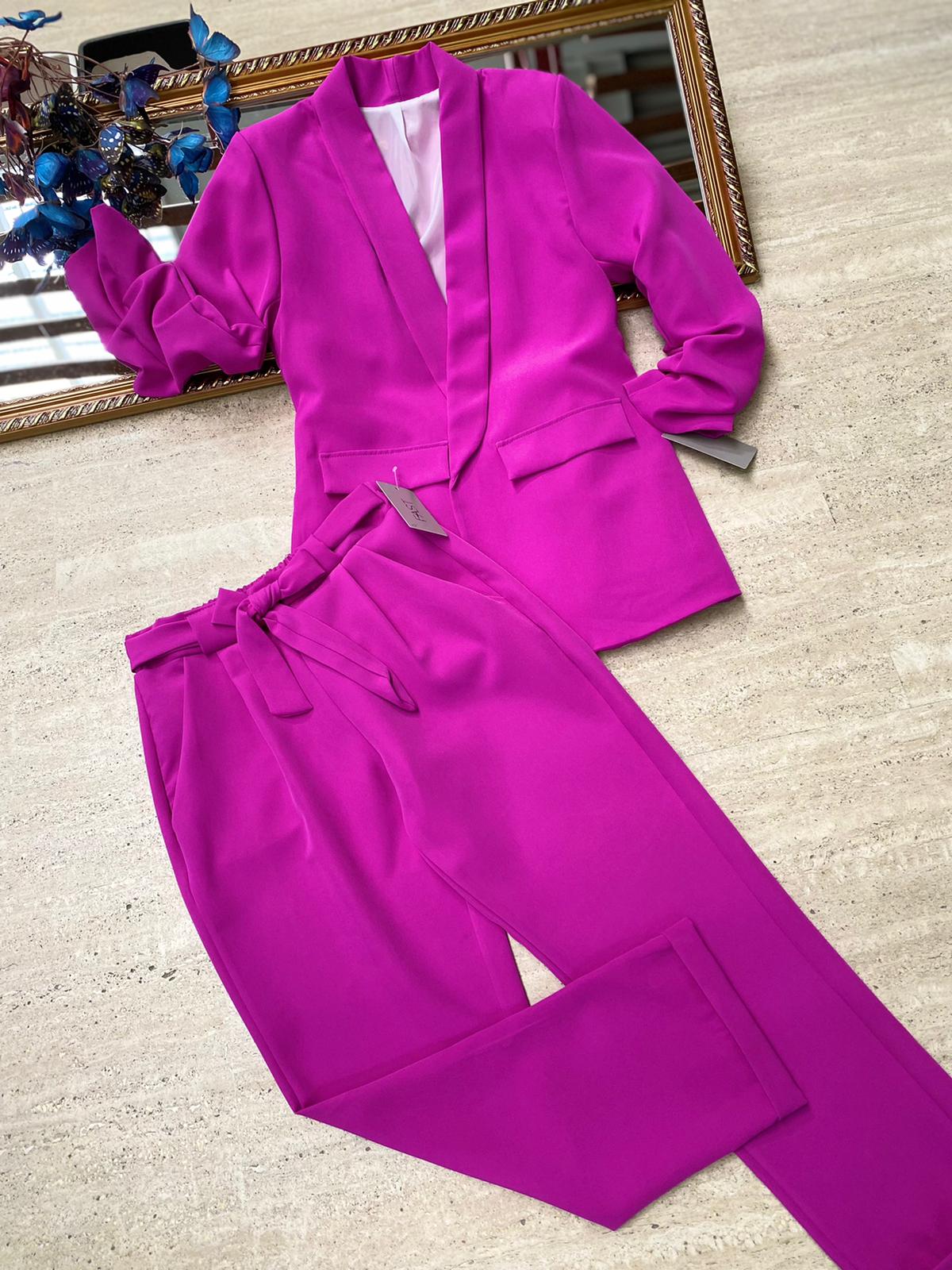 Pantaloni eleganti con fiocco