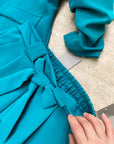 Pantaloni eleganti con fiocco