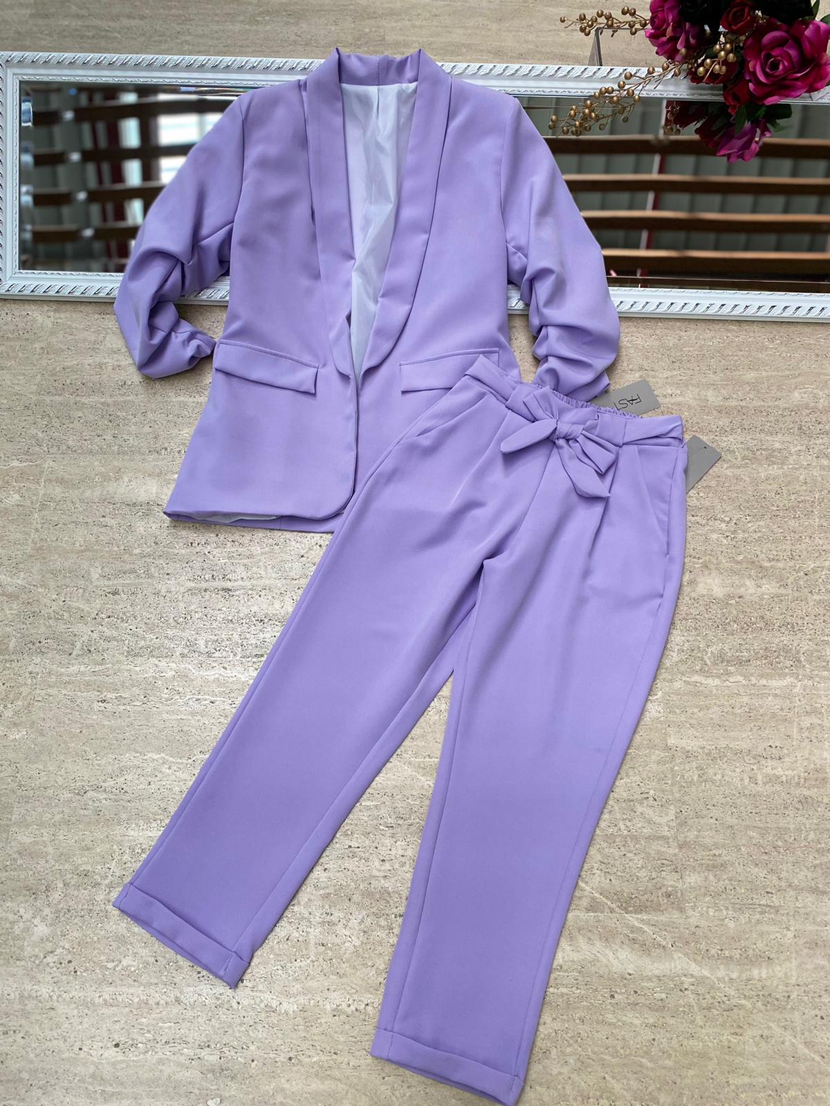Pantaloni eleganti con fiocco