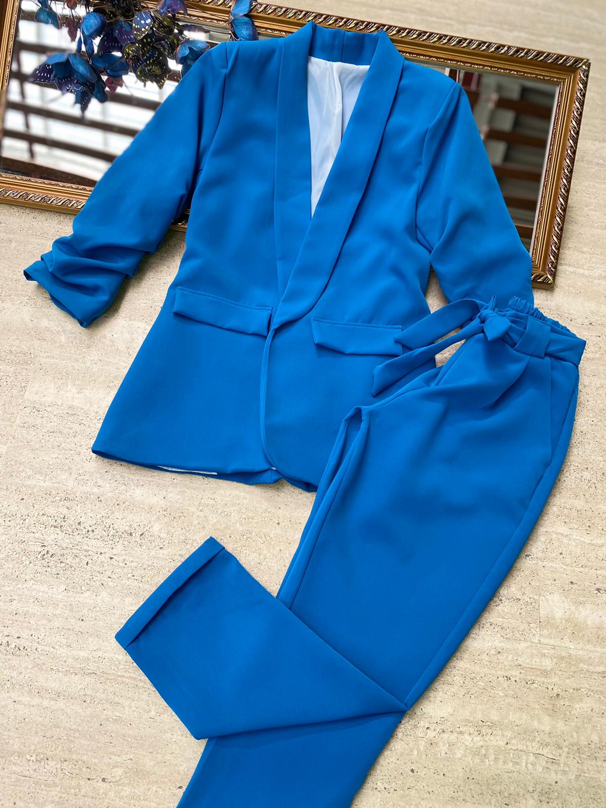Pantaloni eleganti con fiocco