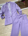 Pantaloni eleganti con fiocco