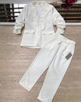 Pantaloni eleganti con fiocco
