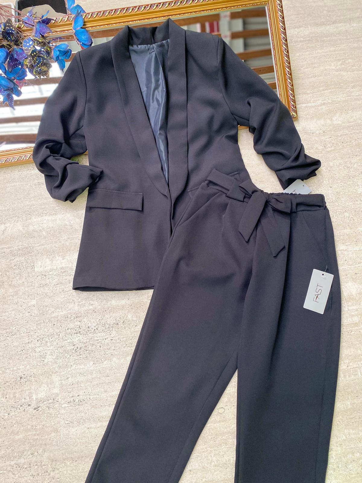 Pantaloni eleganti con fiocco