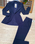 Pantaloni a sigaretta con svolta
